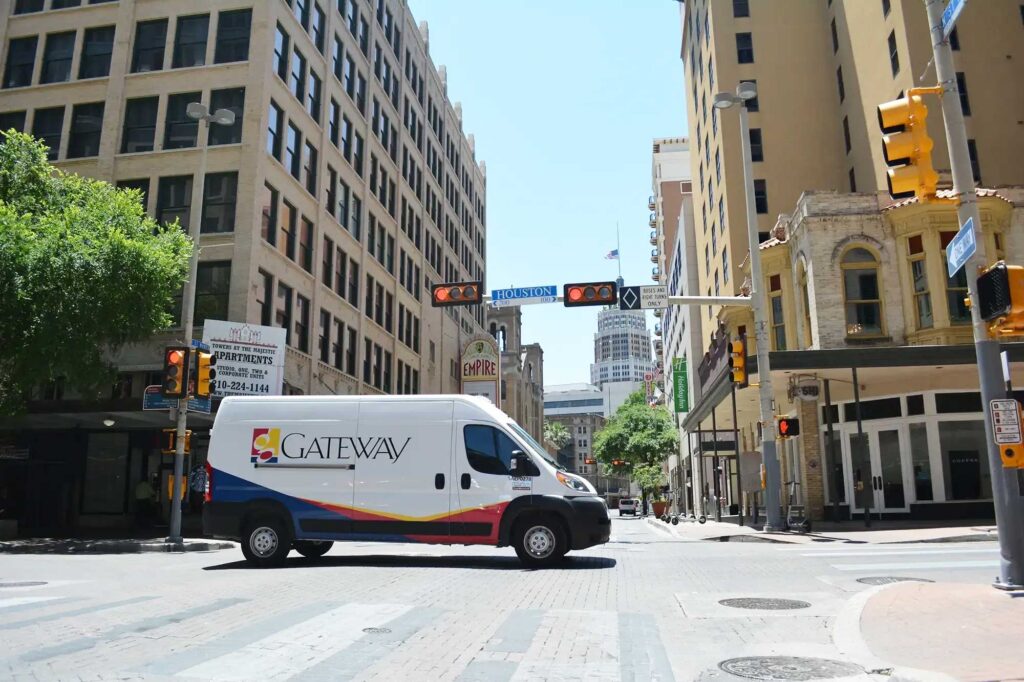 Gateway Delivery Van driving through downtown Houston.