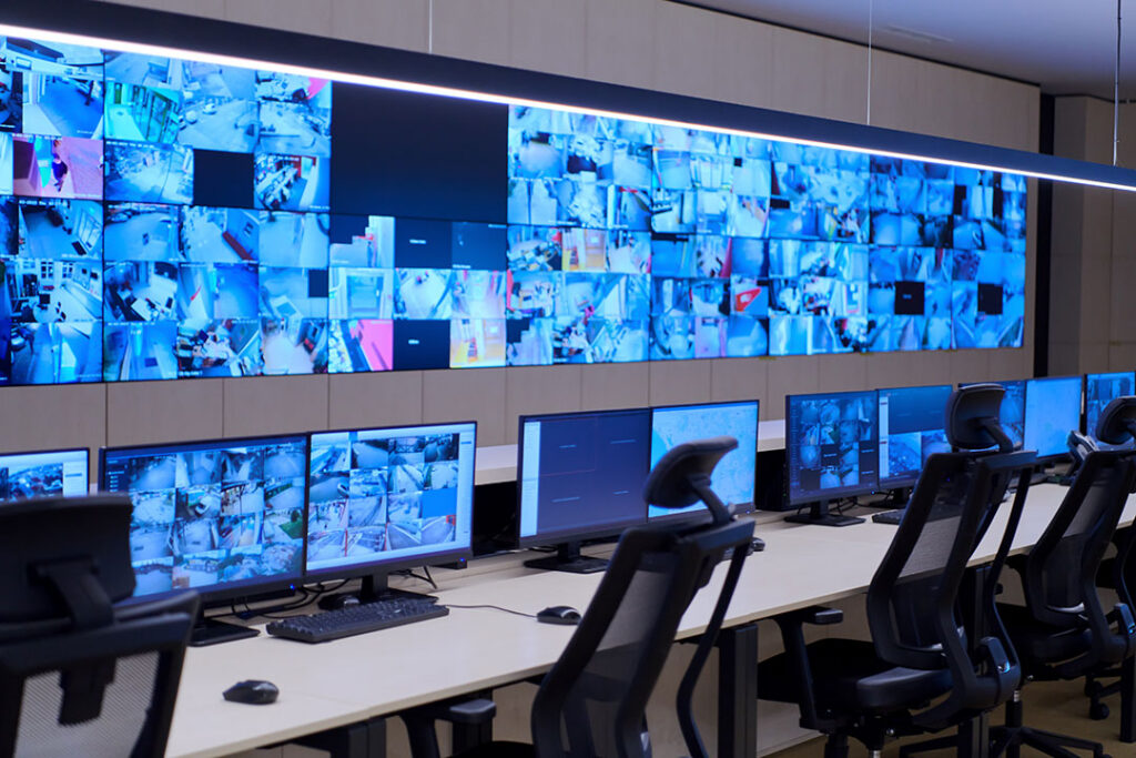 Security Control Room with rows of monitors